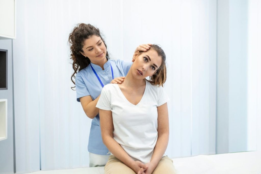 Physiotherapist attending to neck problems